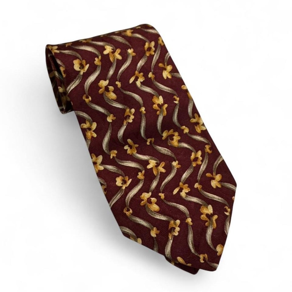 Designer Silk Burgundy necktie featuring yellow/gold‎ floral pattern.